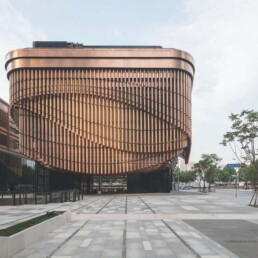 Inspired by theatre curtains, the Fosun Foundation on the Shanghai waterfront is a collaboration with Foster + Partners. Inaugurated in 2017, the building is used to host various events including fashion shows, art exhibitions and conferences.